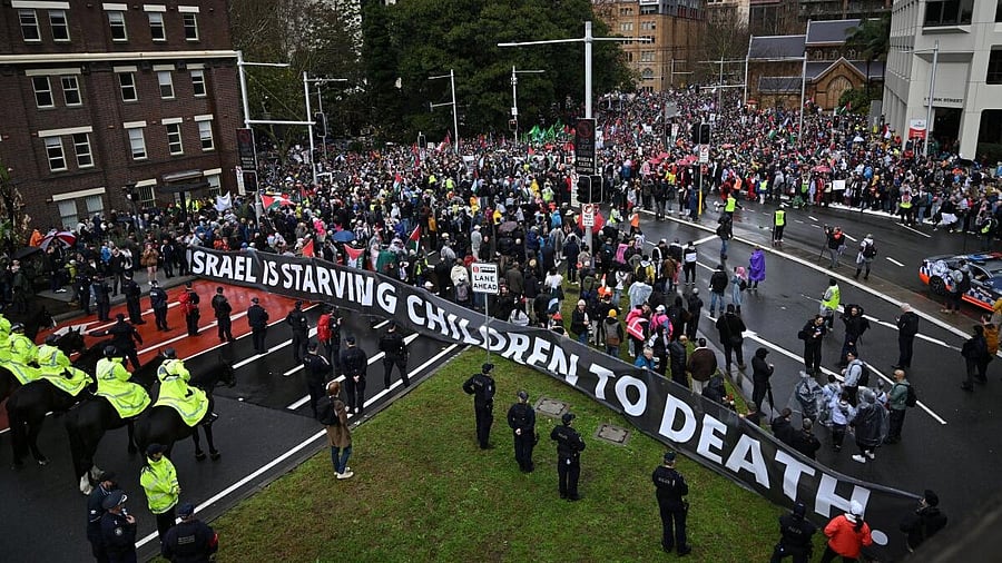 <div class="paragraphs"><p>Protesters gather to walk across the Sydney Harbour Bridge during the Palestine Action Group's March for Humanity in Sydney</p></div>