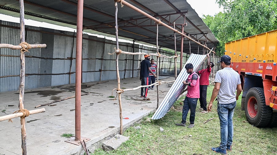 A file photo of a shed being erected for Dasara elephants on palace premises in Mysuru. 