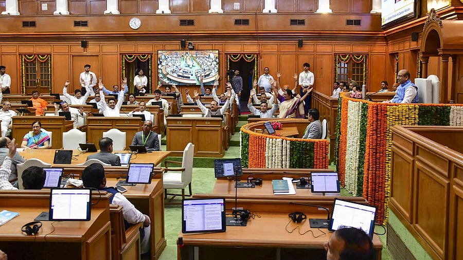 <div class="paragraphs"><p>Delhi Chief Minister Rekha Gupta with cabinet ministers and MLAs during the first day of the state Assembly's Monsoon session, in New Delhi, Monday, Aug. 4, 2025.</p></div>