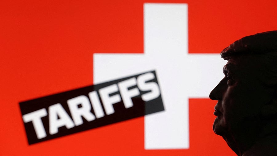<div class="paragraphs"><p>A 3D-printed miniature model of U.S. President Donald Trump, the Switzerland flag and the word "Tariffs" are seen in this illustration taken July 23, 2025.&nbsp;</p></div>