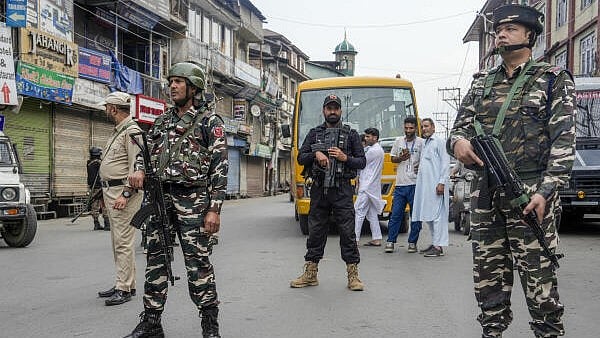 <div class="paragraphs"><p>Security personnel stand guard in Jammu and Kashmir.</p></div>
