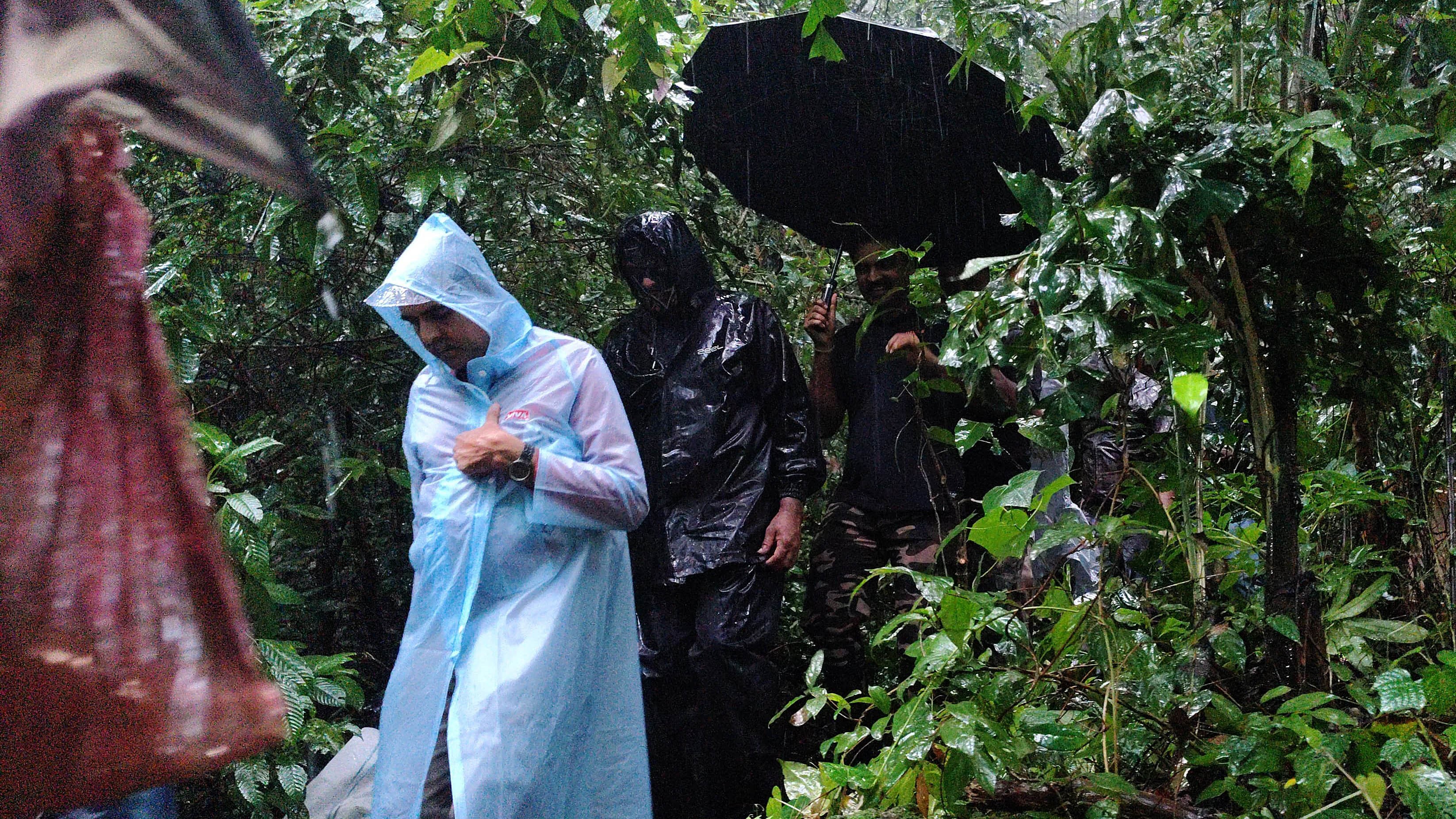 <div class="paragraphs"><p>Complainant witness along with SIT officials coming out of the spot in forest area near Nethravathi bathing ghat in Dharmasthala police station limits, on Tuesday evening. </p></div>