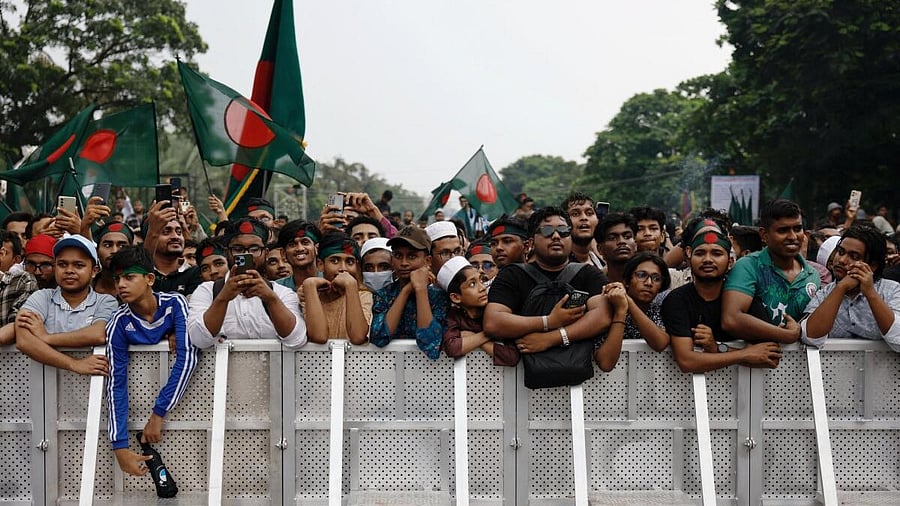 <div class="paragraphs"><p>People attend an open-air concert, during celebrations marking the one-year anniversary of student-led protests that led to the ousting of Bangladeshi then-Prime-Minister Sheikh Hasina in Dhaka</p></div>