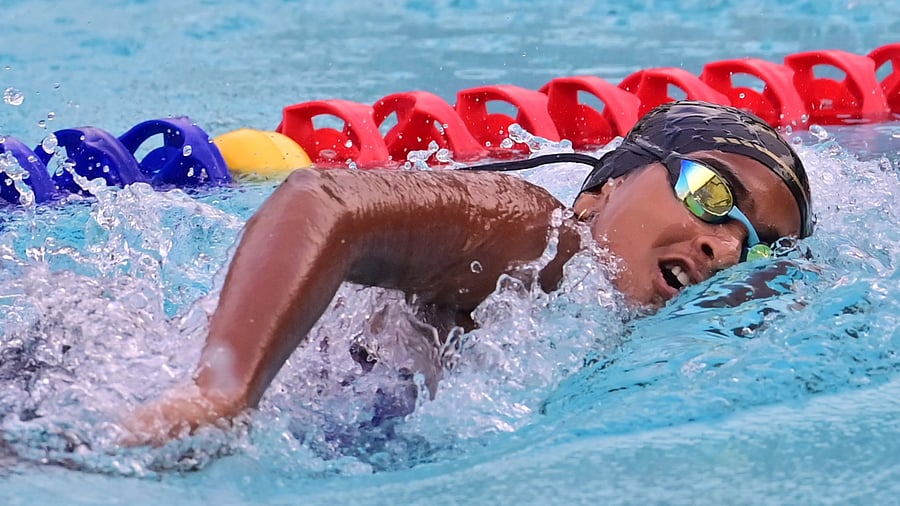 <div class="paragraphs"><p>Goa’s Purvi Ritesh Naik powers her way to the girls’ Group III 100m freestyle gold in the 41st Sub-Junior National Aquatics Championships at BAC in Bengaluru. Shreyash Sachin Sakpal of Maharashtra prepares to dive at the Kensington Swimming Pool on Tuesday. </p></div>