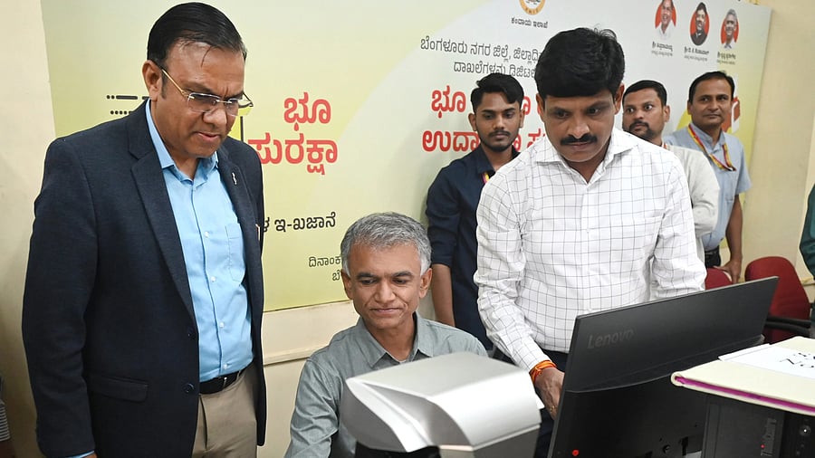 <div class="paragraphs"><p>Revenue Minister Krishna Byre Gowda launches ‘Bhu Suraksha’, programme for digitising land records in the Bengaluru Urban district administration, at the deputy commissioner’s office in Bengaluru on Tuesday. </p></div>