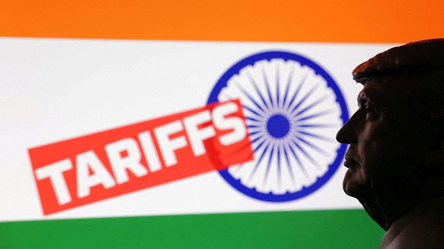 <div class="paragraphs"><p>llustration shows 3D-printed miniature model of U.S. President Donald Trump, India flag and word "Tariffs"</p></div>