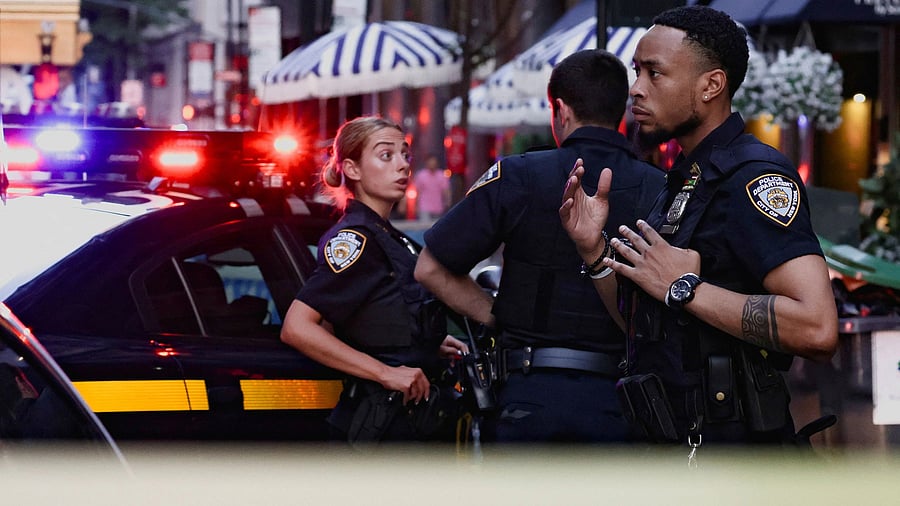 <div class="paragraphs"><p>Police members gather during a reported active shooter situation.</p></div>
