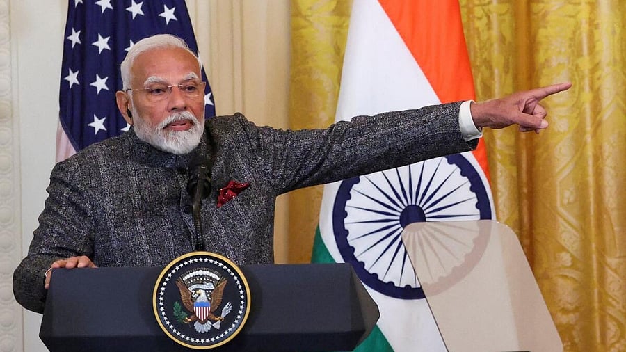 <div class="paragraphs"><p>Prime Minister Narendra Modi gestures during a joint press conference with U.S. President Donald Trump at the White House in Washington, DC, US, February 13, 2025.</p></div>