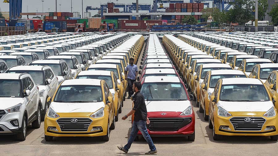 <div class="paragraphs"><p>Cars are seen parked in a dock at the Chennai Port Trust. </p></div>