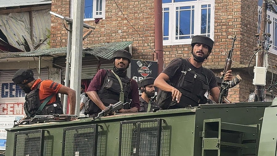 <div class="paragraphs"><p>Security personnel on the sixth day of anti-terrorist operation, in Jammu and Kashmir's Kulgam.</p></div>