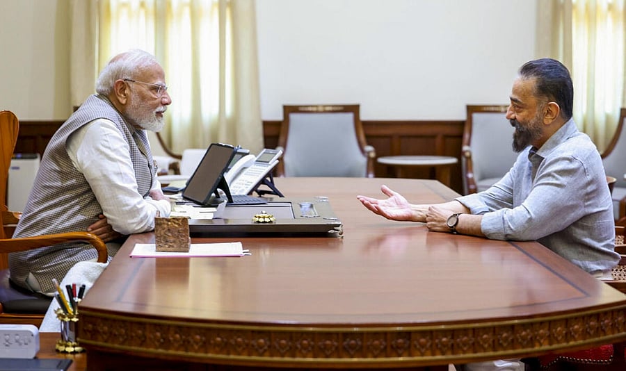 <div class="paragraphs"><p>PM Modi with MNM MP Kamal Haasan</p></div>