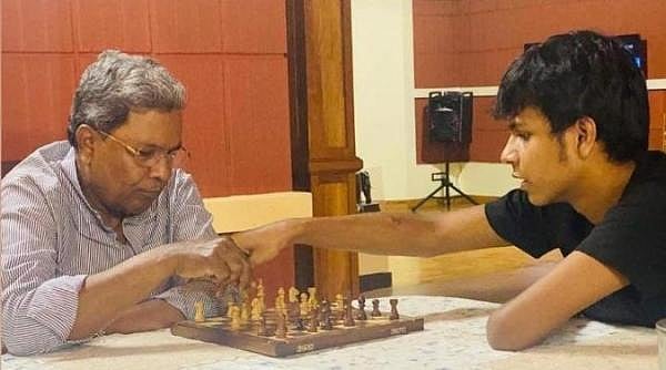 <div class="paragraphs"><p>Karnataka CM Siddaramaiah (L) with his grandson Dhawan Rakesh.</p></div>