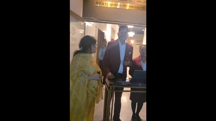 <div class="paragraphs"><p>Screengrab from video of a couple being denied entry to an eatery</p></div>