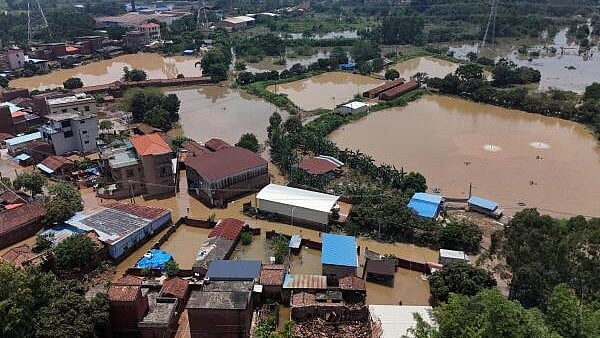 <div class="paragraphs"><p>A drone view shows flooded houses and fish farms after days of heavy rainfall, in Qingyuan, Guangdong province, China August 8, 2025.</p></div>