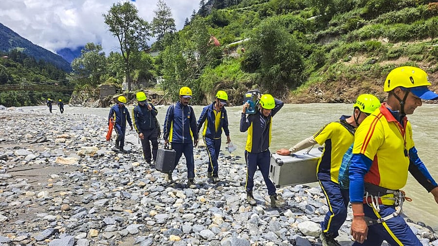 <div class="paragraphs"><p>Rescue personnel amid repair and restoration work after the recent flash floods, at the disaster-hit Dharali area.</p></div>