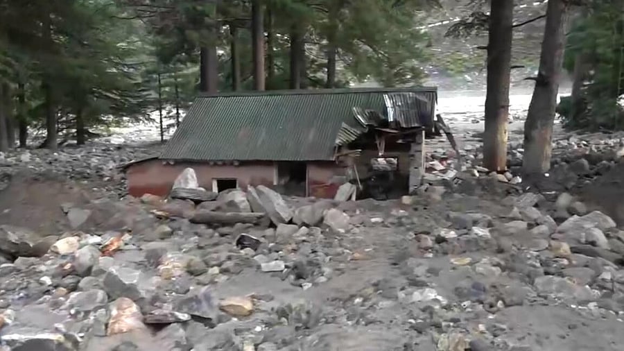 <div class="paragraphs"><p>A damaged structure at an affected area following mudslide and flash floods</p></div>