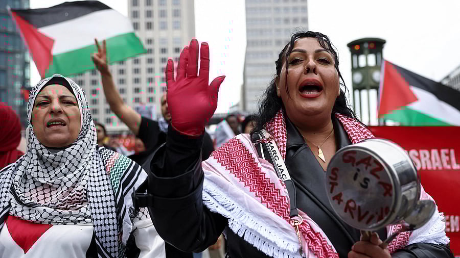 <div class="paragraphs"><p>People protest against Israel and in solidarity with Palestinian children in Gaza, at Potsdamer Platz, in Berlin, Germany</p></div>