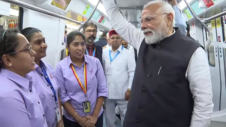 <div class="paragraphs"><p>PM Modi taking a ride on a Yellow Line metro train in Bengaluru, August 10, 2025.</p></div>