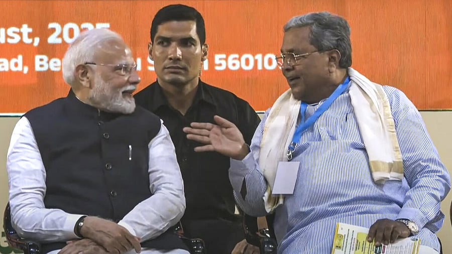 <div class="paragraphs"><p>In this screenshot from @NarendraModi via YouTube on Aug. 10, 2025, Prime Minister Narendra Modi with Karnataka Chief Minister Siddaramaiah during an event to lay the foundation stone of development projects and the inauguration of the Yellow Line of Namma Metro in Bengaluru.</p></div>