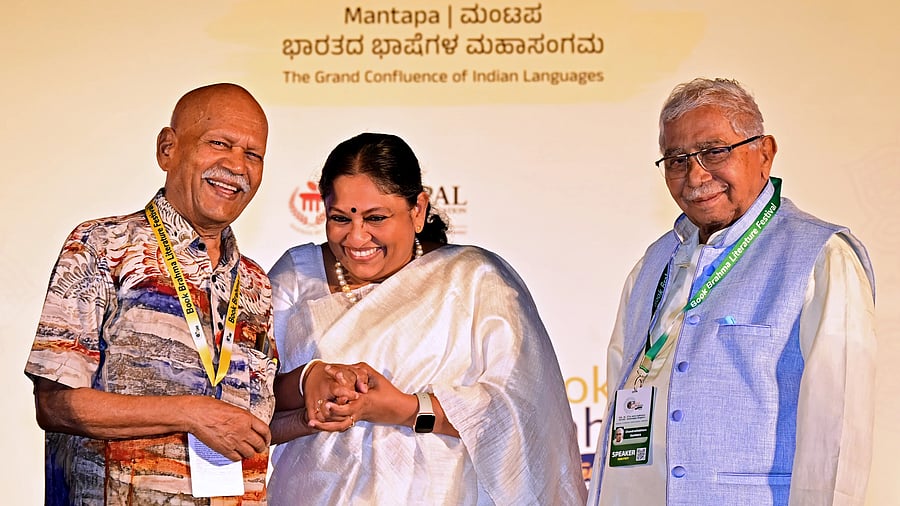 <div class="paragraphs"><p>Malayalam writer KR Meera shares a light moment with litterateurs Prof Hampa Nagarajaiah and Chandrashekhar Kambara at the litfest on Sunday. Meera received the 'Book Brahma Sahitya Puraskara' for her contribution to Malayalam literature. </p></div>