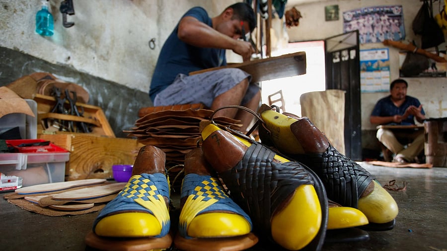 <div class="paragraphs"><p>Traditional Indigenous sandal are pictured in a workshop as Juan Aquino makes a sandal in Villa Hidalgo Yalalag while the Mexican government stepped in on Friday to mediate a dispute between Indigenous artisans from Oaxaca and Adidas over cultural appropriation claims involving the "Oaxaca Slip On" shoe, designed by Willy Chavarria, in Villa Hidalgo Yalalag, Oaxaca, Mexico, August 9, 2025.  </p></div>
