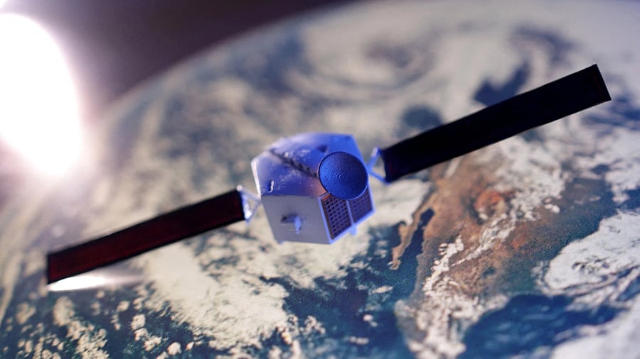 <div class="paragraphs"><p>A satellite model is placed on a picture of Earth in this illustration </p></div>