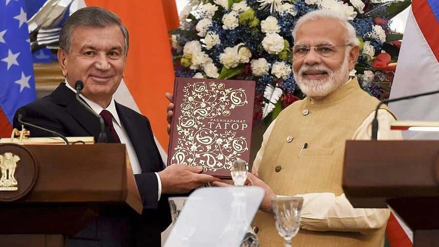 <div class="paragraphs"><p>Prime Minister Narendra Modi with Uzbek President Shavkat Mirziyoyev </p></div>
