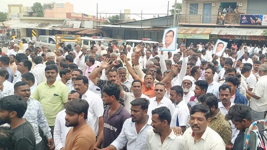 <div class="paragraphs"><p>Supporters of K N Rajanna take out a protest march in Madhugiri, Tumakuru district, on Tuesday, demanding that their leader be reinducted into the Siddaramaiah Cabinet. </p></div>