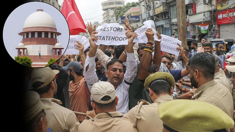 <div class="paragraphs"><p>Policemen attempt to stop National Conference (JKNC) workers during a protest march demanding restoration of statehood to Jammu and Kashmir, (inset) a view of Supreme Court.</p></div>