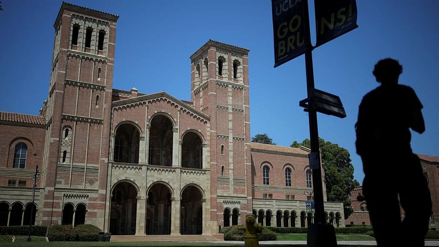 <div class="paragraphs"><p>A person walks past Royce Hall at the University of California Los Angeles (UCLA) in Los Angeles, California, US, August 11, 2025.</p></div>
