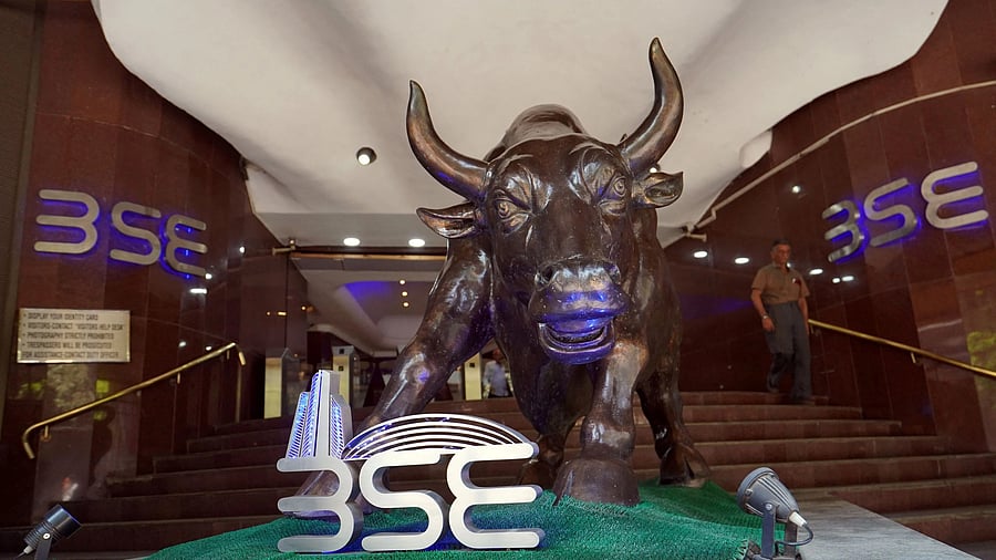 <div class="paragraphs"><p>A man walks out of the Bombay Stock Exchange (BSE) building in Mumbai, India, February 28, 2020. </p></div>