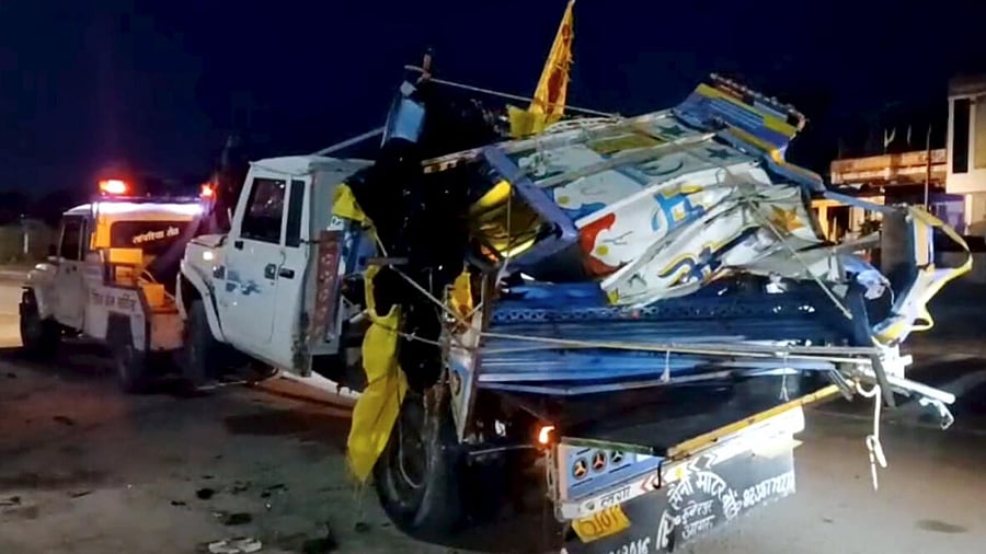 <div class="paragraphs"><p>Wreckage of a vehicle being taken away after a pickup van allegedly crashed into a parked truck, in Rajasthan's Dausa district.</p></div>
