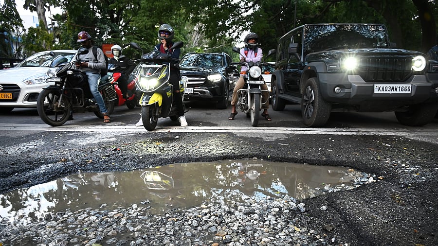 The state of a road near Trinity Circle. DH file photo