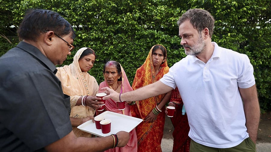 <div class="paragraphs"><p>Congress leader and LoP in Lok Sabha Rahul Gandhi interacts with people allegedly declared 'dead' in Election Commision' voter list, in New Delhi</p></div>