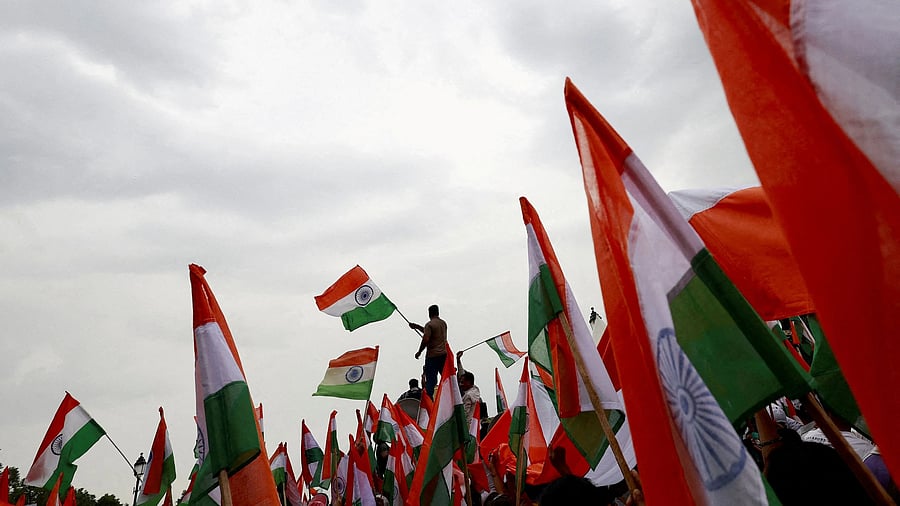 <div class="paragraphs"><p>People wave Indian flags. image for representational purposes.</p></div>