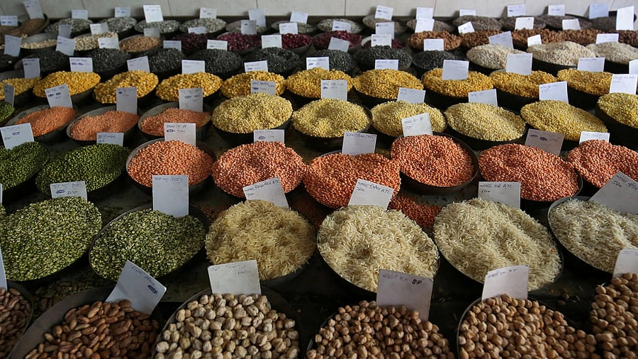 <div class="paragraphs"><p>FILE PHOTO: Price tags are seen on the samples of rice and lentils that are kept on display for sale at a wholesale market in the old quarters of Delhi.</p></div>