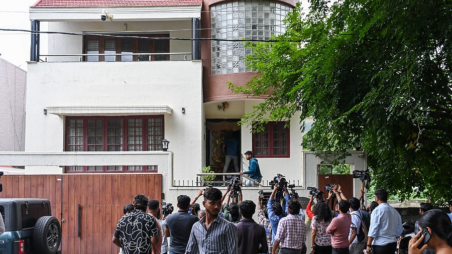 Actor Darshan’s fans outside his house in Rajarajeshwari Nagar in Bengaluru on Thursday. DH PHOTO/PUSHKAR V
