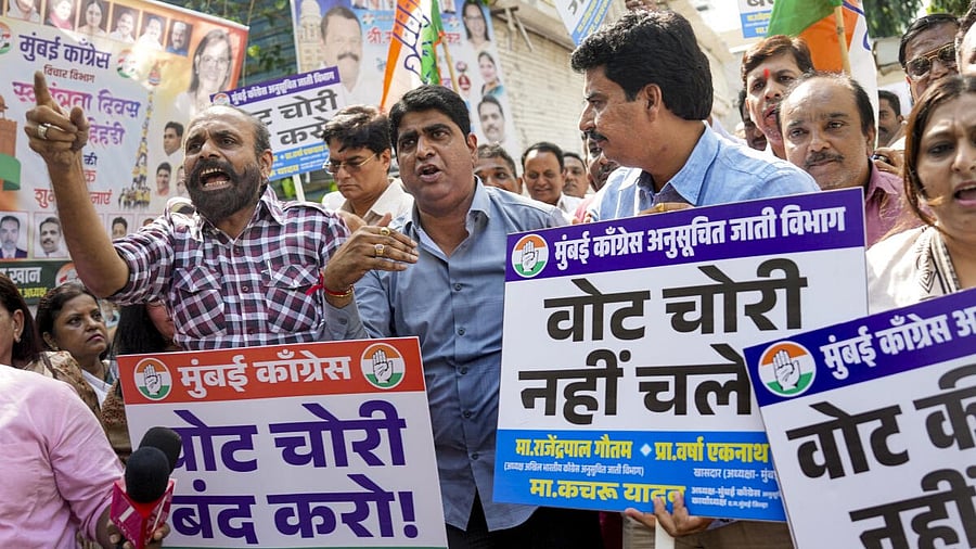 <div class="paragraphs"><p>Congress party workers stage a protest over alleged 'vote chori' and Special Intensive Revision (SIR) of electoral rolls, in Mumbai.</p></div>