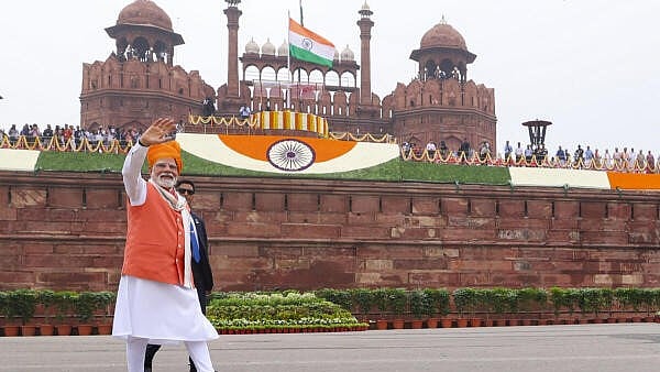 <div class="paragraphs"><p>Prime Minister Narendra Modi waves during the 79th Independence Day celebration at the Red Fort, in New Delhi</p></div>