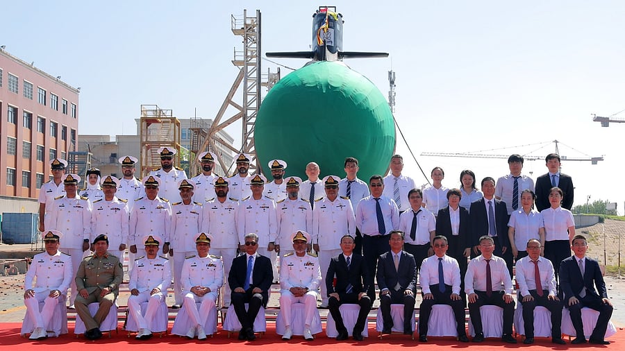 <div class="paragraphs"><p>Vice Admiral Abdul Samad in a group photo with officials of Pakistan Navy and China Shipyard during Launching Ceremony of&nbsp;3rd HANGOR Class Submarine of Pakistan Navy at Wuhan, China.</p></div>