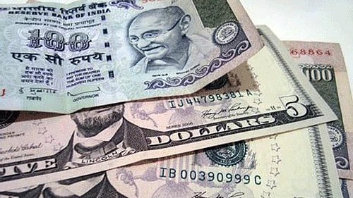 <div class="paragraphs"><p>Indian Rupees kept on US Dollars. (Representational Image)</p></div>