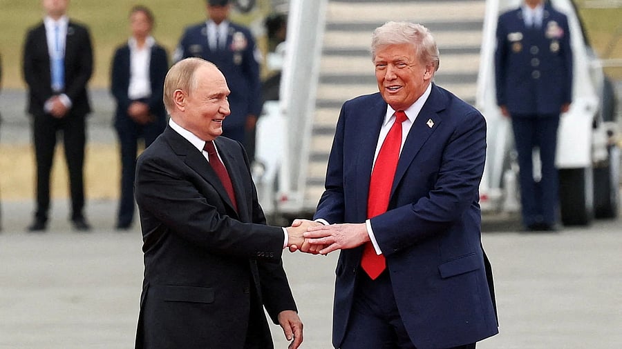 <div class="paragraphs"><p>US President Donald Trump shakes hand with Russian President Vladimir Putin, as they meet to negotiate for an end to the war in Ukraine, at Joint Base Elmendorf-Richardson in Anchorage, Alaska.</p></div>