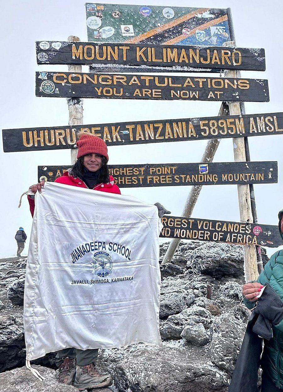 <div class="paragraphs"><p>Nithya Rao holds the flag of Jnanadeepa school atop Kilimanjaro mountain, the highest peak in Africa.<strong> </strong></p></div>