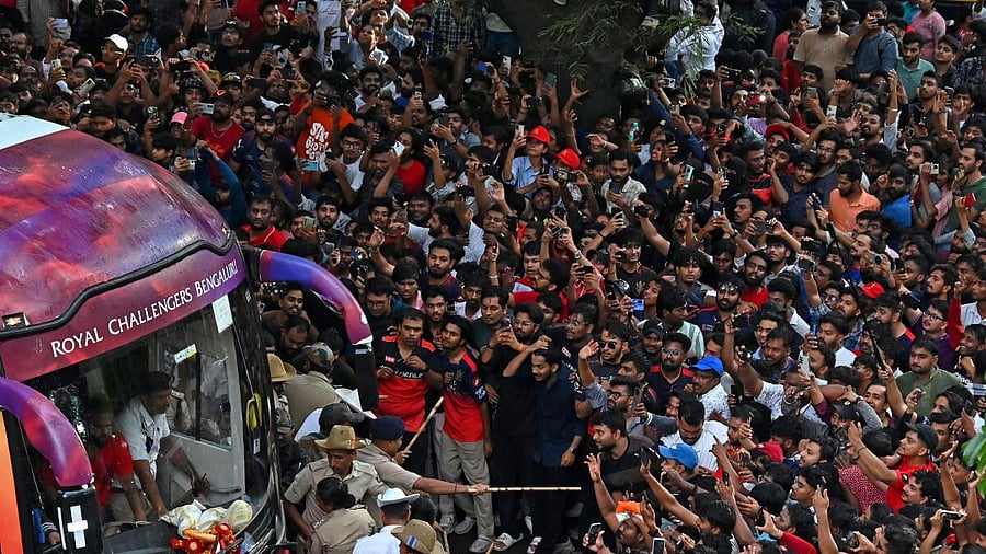 <div class="paragraphs"><p>A huge number of people outside M Chinnaswamy Stadium throng to witness the victory celebration of Royal Challengers Bengaluru's win in the 18th edition of the Indian Premier League at their home ground on Wednesday, June 04, 2025.</p></div>