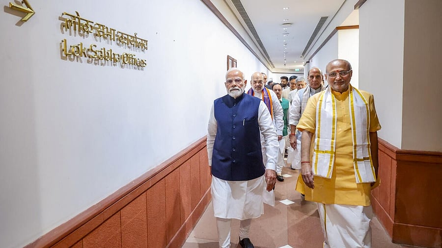 <div class="paragraphs"><p>Prime Minister Narendra Modi with Maharashtra Governor and NDA's candidate CP Radhakrishnan and other party leaders</p></div>