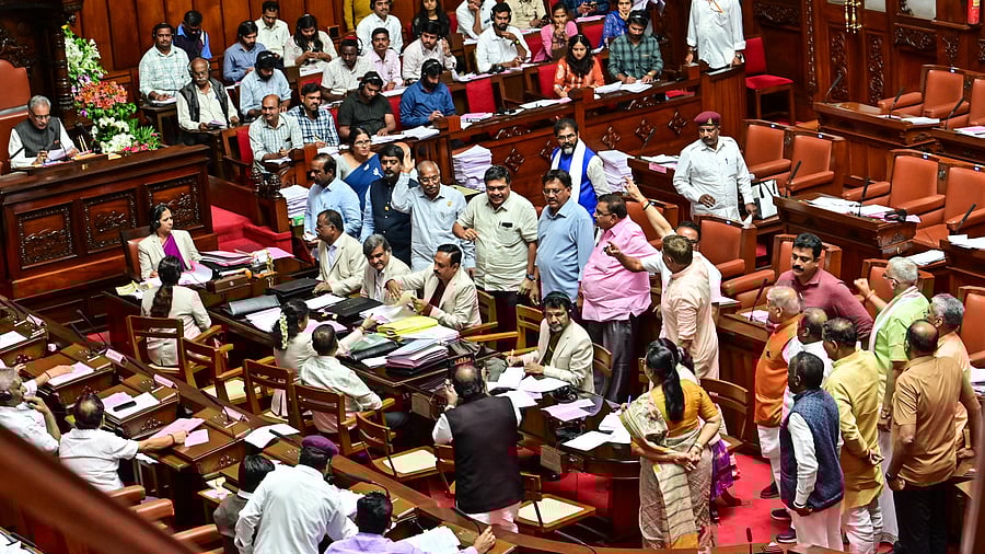 <div class="paragraphs"><p>The BJP and JD(S) members stage a protest in the Legislative Council on Friday, demanding that the government withdraw the restriction on the use of DJ sound systems after 10 pm during the Ganesha festival celebration. </p></div>
