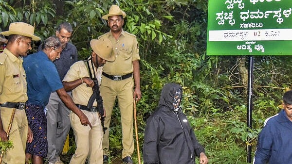 <div class="paragraphs"><p>SIT arrests complainant who alleged murders, rapes, burials.</p></div>