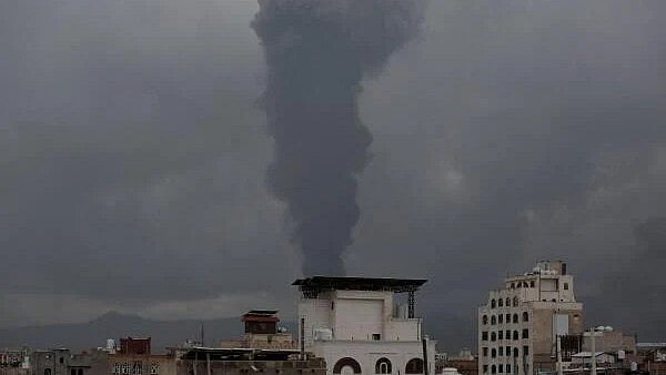 <div class="paragraphs"><p>Smoke billows from the site of Israeli air strikes in Sanaa, Yemen.</p></div>