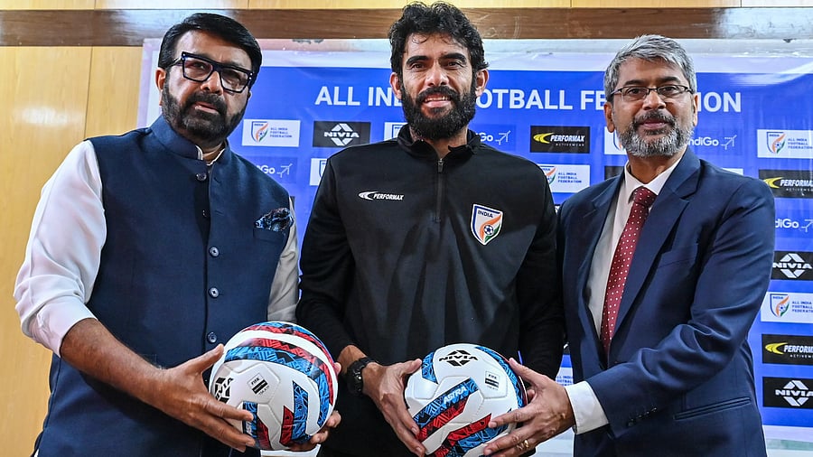 <div class="paragraphs"><p>AIFF vice-president and KSFA president NA Haris (left), India head coach Khalid Jamil (centre) and AIFF President Kalyan Chaubey announce India's 23-member squad for CAFA Nations Cup 2025 at Press Club of Bangalore on Monday. </p></div>