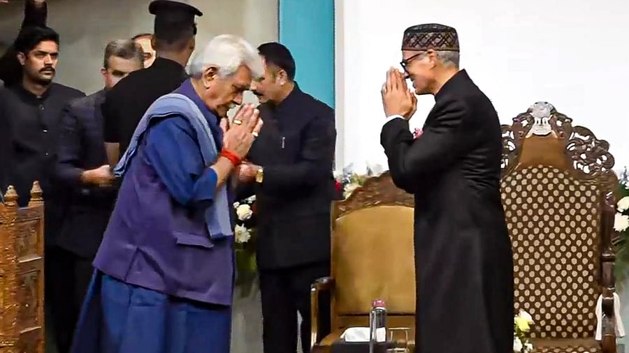 <div class="paragraphs"><p>Jammu and Kashmir Lieutenant Governor Manoj Sinha being greeted by CM Omar Abdullah before the latter's swearing-in ceremony, in Srinagar.</p></div>